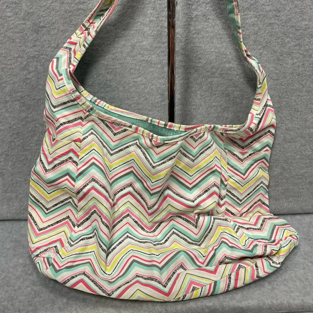 Thirty One Retired Roundabout Reversible Party Punch Hobo Bag